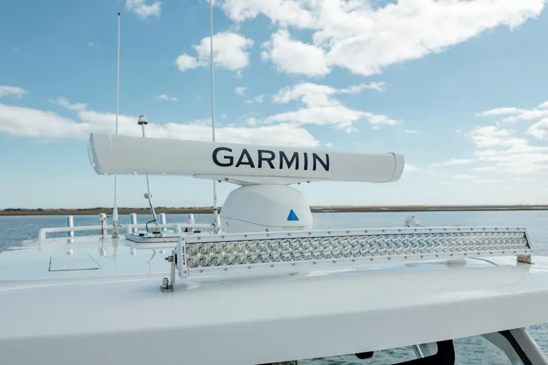 Slide: The Image of 2022 Pursuit S 328 boat with Garmin radar system. - 49