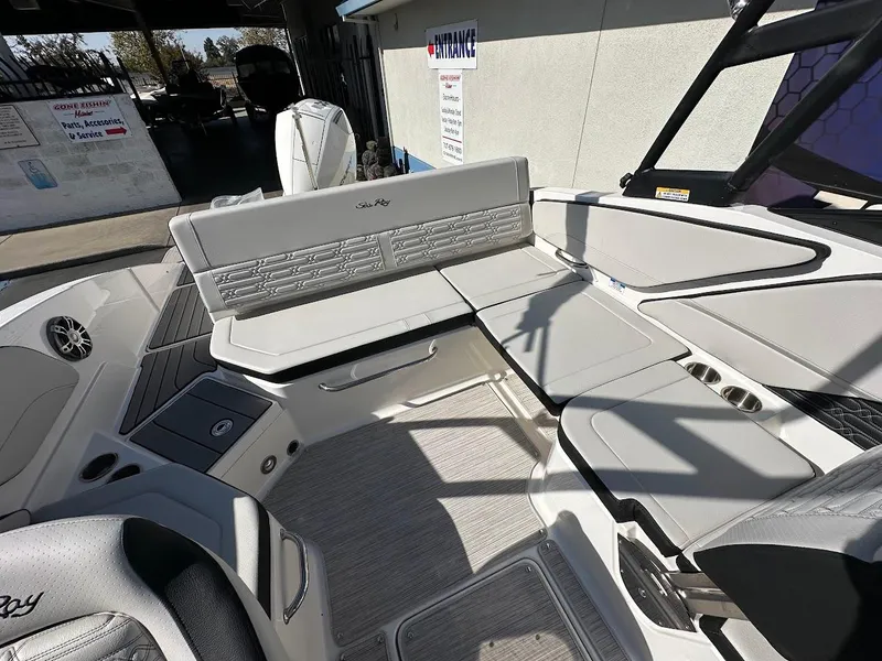 Slide: The Image of 2024 Sea Ray SPX 210 OB boat interior with sleek seating and modern design. - 10