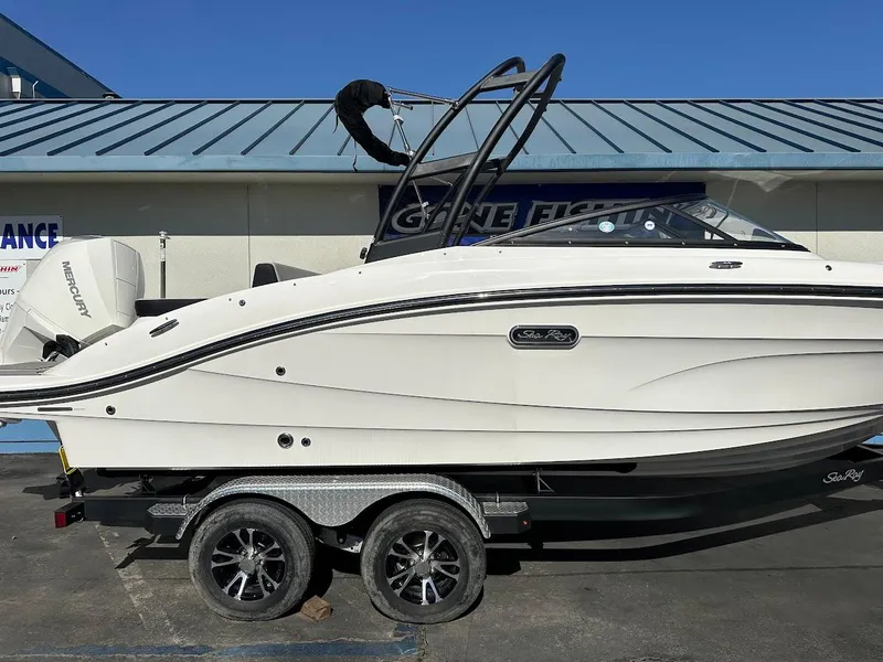 Slide: The Image of 2024 Sea Ray SPX 210 OB boat on trailer, side view, white exterior. - 2