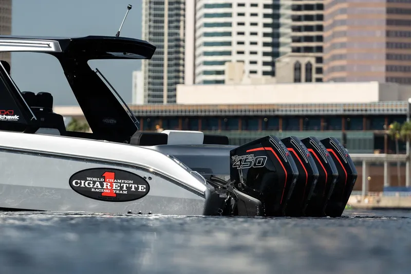 Slide: The Image of 2022 Cigarette 41 Nighthawk boat with quad engines in urban waterfront. - 13