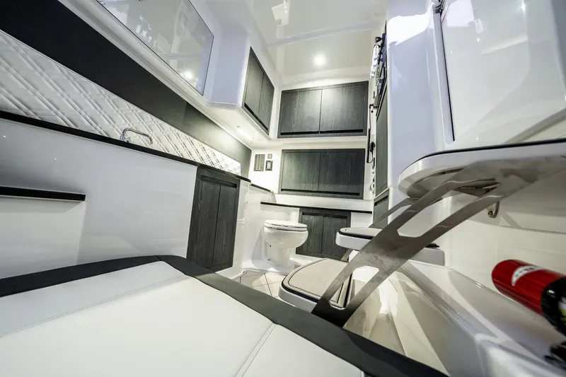 Slide: The Image of 2022 Cigarette 41 Nighthawk interior with modern cabinetry and seating. - 17