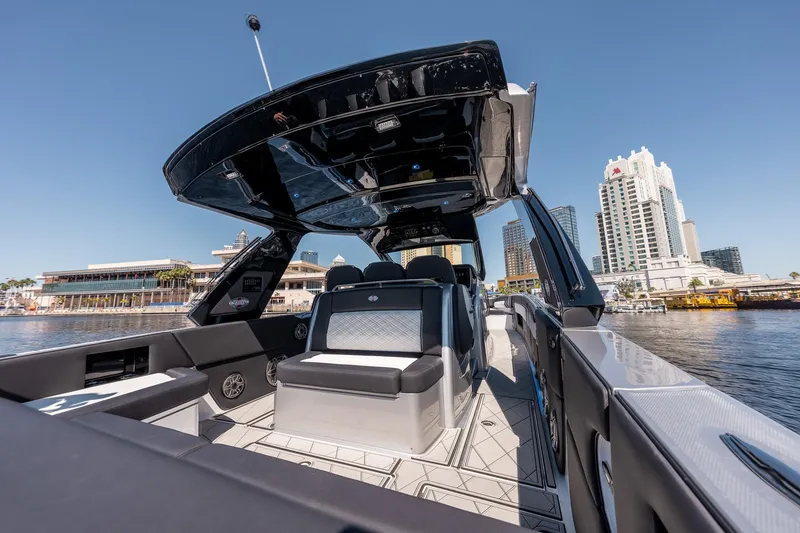 Slide: The Image of 2022 Cigarette 41 Nighthawk luxury boat interior with cityscape background. - 9