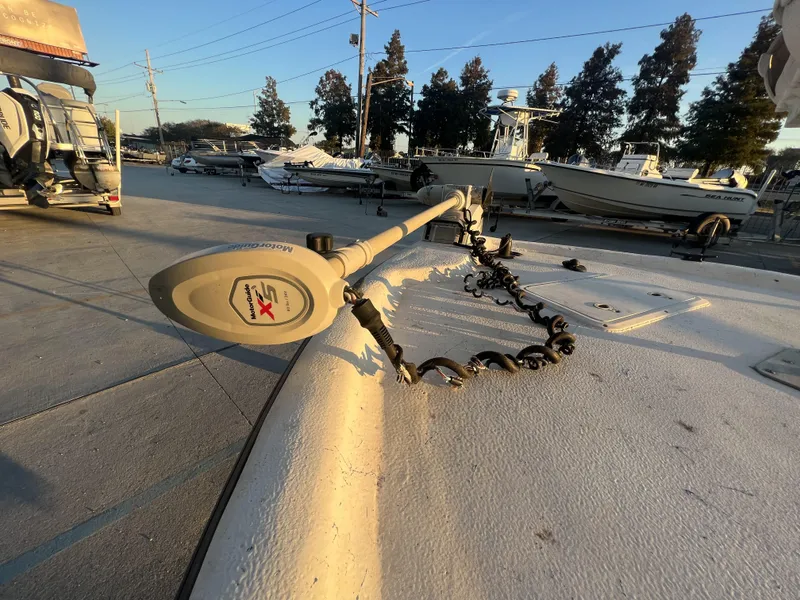Slide: The Image of Close-up of MotorGuide X5 on 1999 Sprint Pro Master 22 CC boat in marina. - 13