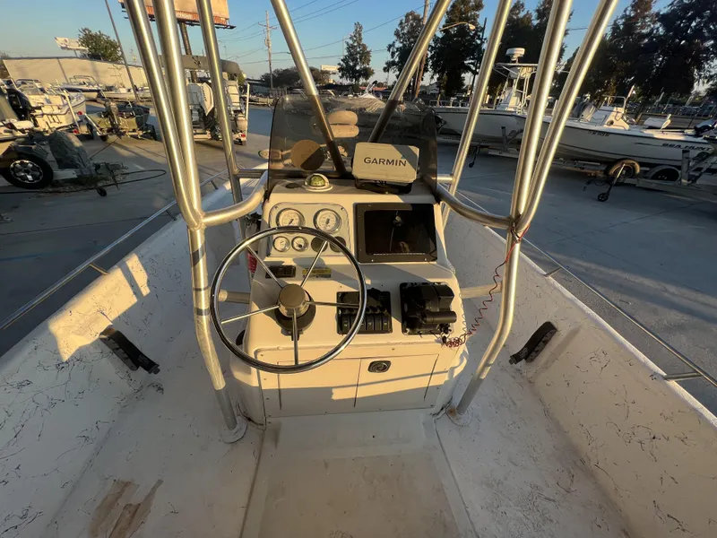 Slide: The Image of 1999 Sprint Pro Master 22 CC boat console with Garmin GPS in a marina. - 5