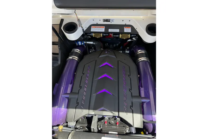Slide: The Image of 2024 MasterCraft X26 engine with purple accents and supercharged branding. - 17