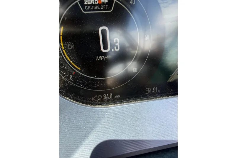 Slide: The Image of Close-up of 2024 MasterCraft X26 speedometer displaying 0.3 MPH and 64.6 hours. - 13