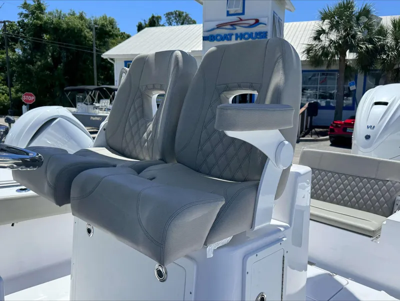 Slide: The Image of 2024 Sportsman 267 Masters OE boat with dual captain's chairs at The Boat House. - 7