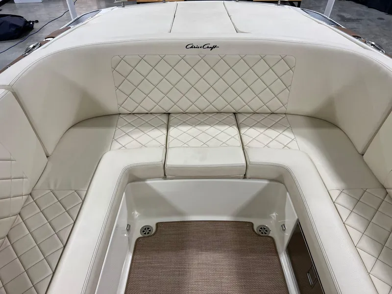 Slide: The Image of Luxurious interior of 2023 Chris-Craft Launch 27 boat with quilted seating. - 25