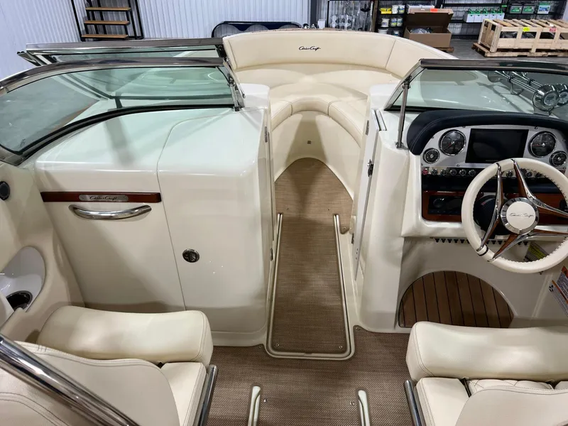Slide: The Image of 2023 Chris-Craft Launch 27 boat interior with elegant seating and modern dashboard. - 33