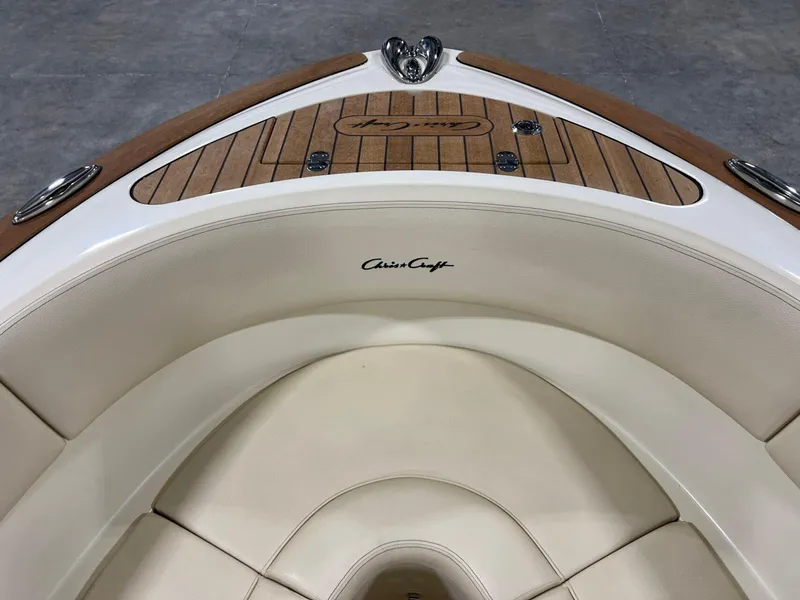 Slide: The Image of 2023 Chris-Craft Launch 27 boat interior with elegant seating and wood accents. - 39