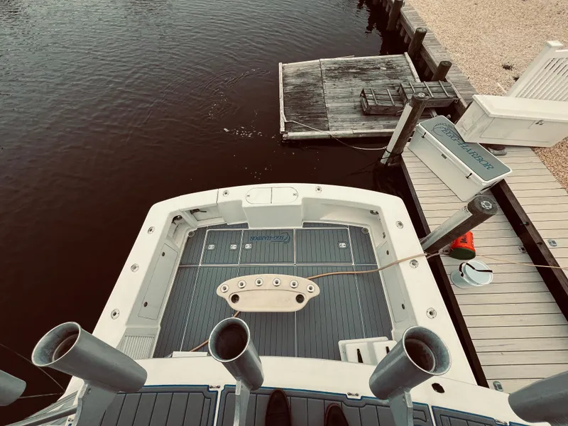 Slide: The Image of Top view of 2002 Egg Harbor 42 Sport Fish boat docked at marina. - 11