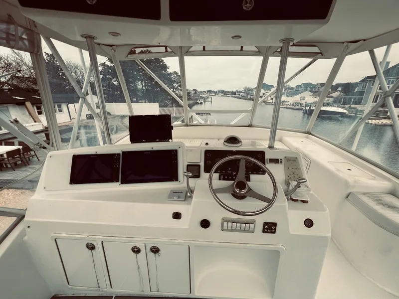 Slide: The Image of Helm of 2002 Egg Harbor 42 Sport Fish boat with navigation equipment. - 6