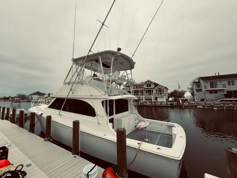 Slide: The Image of 2002 Egg Harbor 42 Sport Fish yacht docked at a marina. - 8