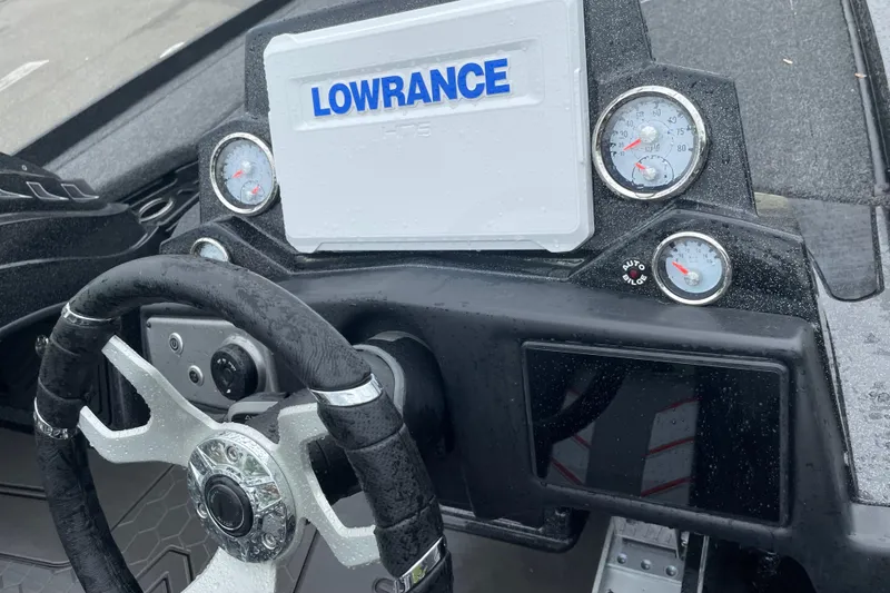 Slide: The Image of 2024 Nitro Z21 XL Pro boat dashboard with Lowrance display and gauges. - 4