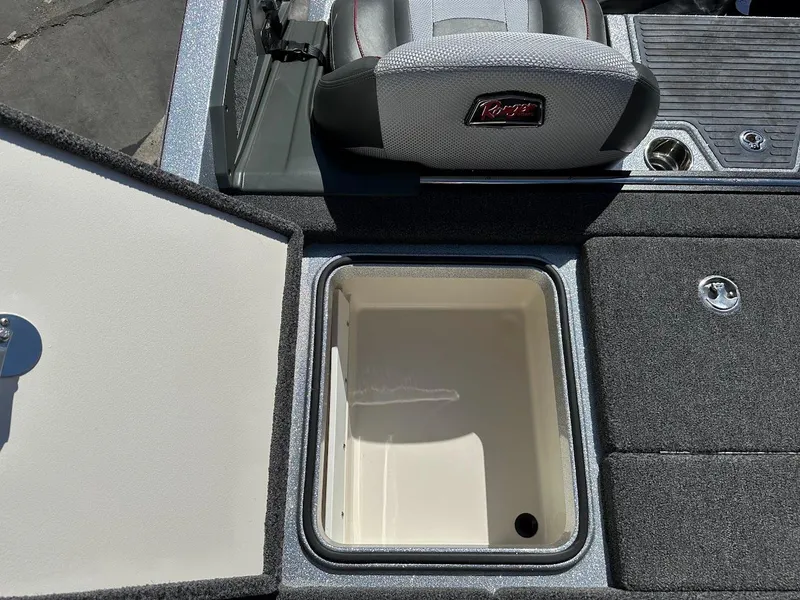 Slide: The Image of 2024 Ranger Z519 boat storage compartment and seating area. - 32