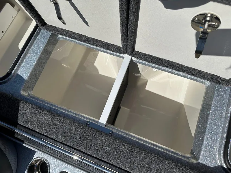 Slide: The Image of 2024 Ranger Z519 storage compartment with open lids, showcasing spacious interior. - 33