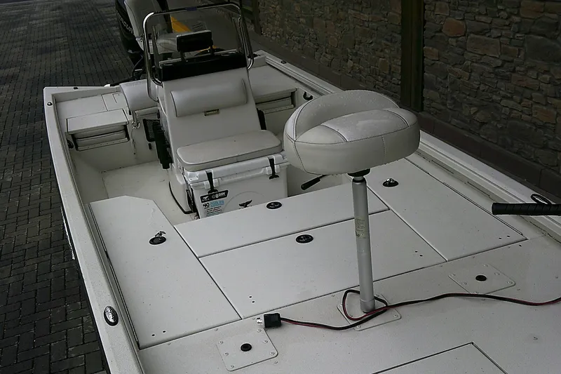 Slide: The Image of 2024 Ranger RB210 boat interior with seating and storage compartments. - 5