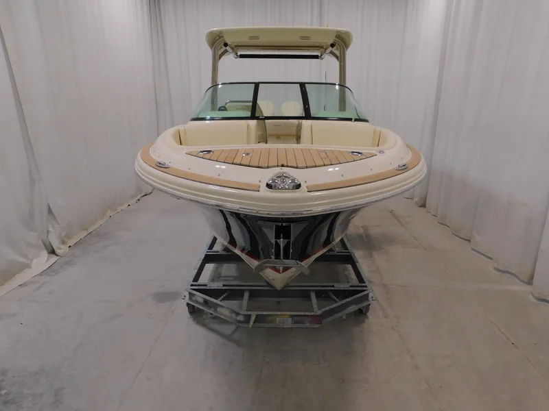 Slide: The Image of 2024 Chris-Craft Calypso 28 boat in indoor storage. - 3