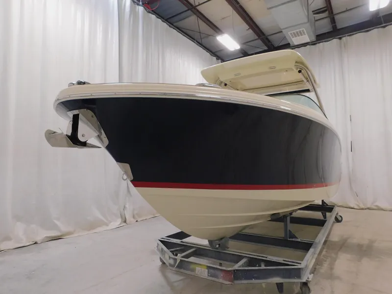 Slide: The Image of 2024 Chris-Craft Calypso 28 boat in indoor storage facility. - 7