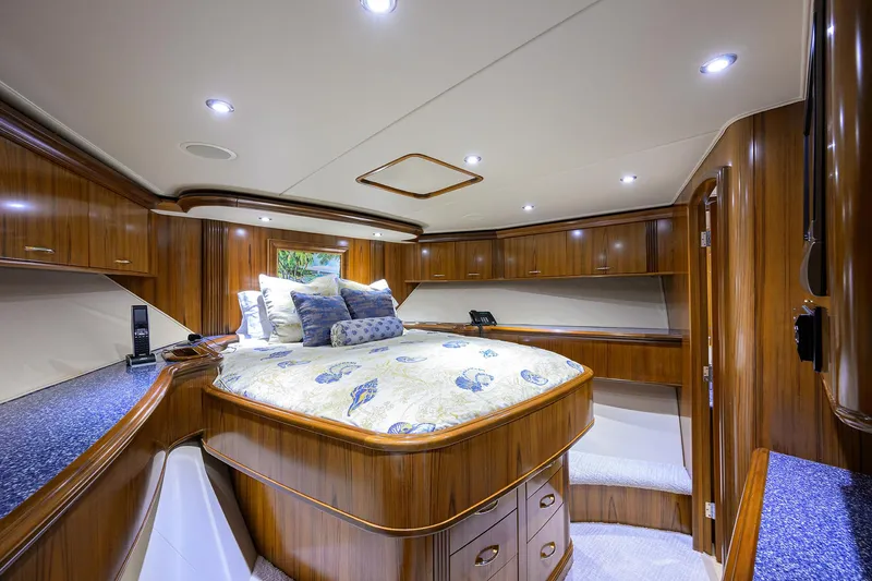 Slide: The Image of Luxurious bedroom interior of 2004 Sea Force IX 82 Enclosed Bridge yacht with wood finish. - 39