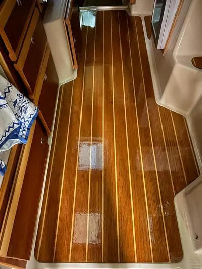 Slide: The Image of 2016 Cutwater 30 Sedan interior with polished wooden floor - 19