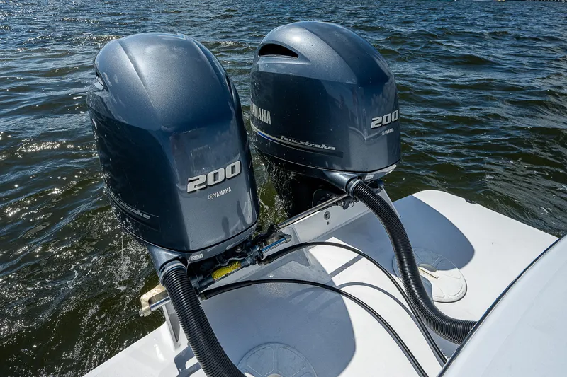 Slide: The Image of Twin Yamaha 200 engines on a 1969 Bertram 25 Moppie boat. - 17