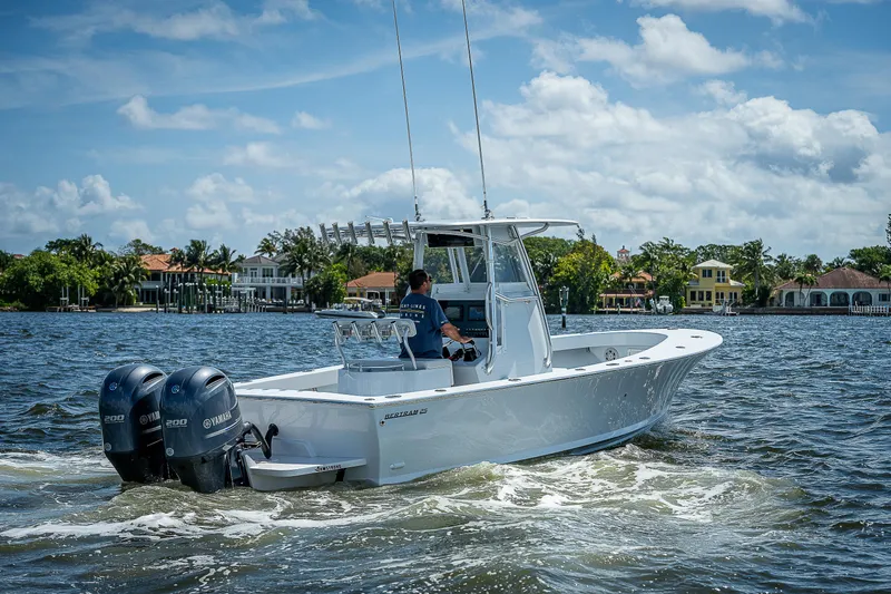 Slide: The Image of 1969 Bertram 25 Moppie boat cruising on a sunny day. - 24