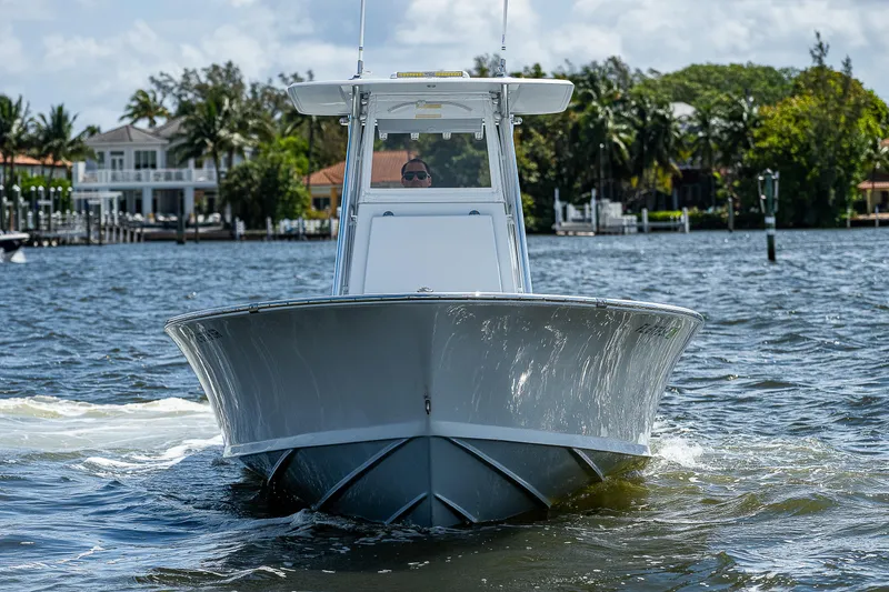 Slide: The Image of 1969 Bertram 25 Moppie boat cruising on a sunny day. - 27
