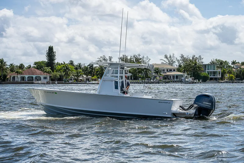 Slide: The Image of 1969 Bertram 25 Moppie boat cruising on a sunny day. - 32