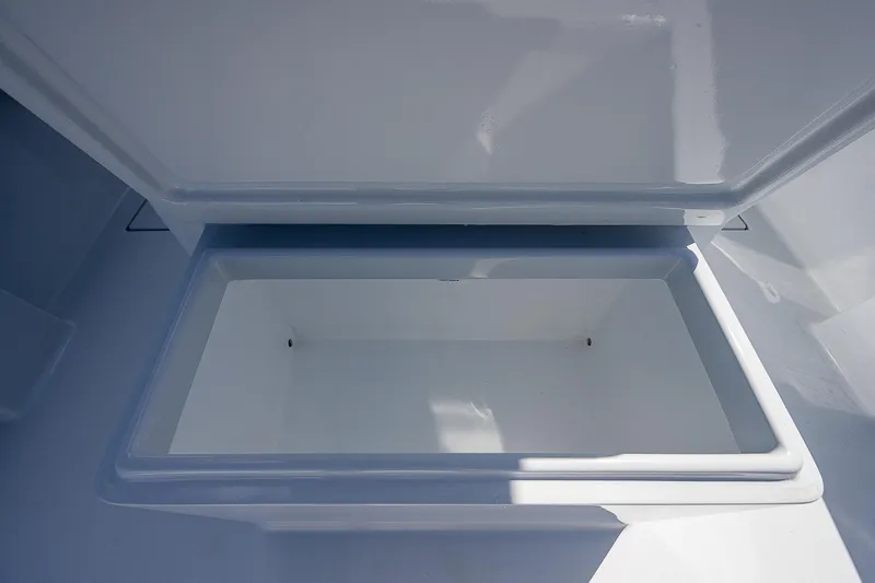 Slide: The Image of Open storage compartment on a 1969 Bertram 25 Moppie boat. - 7