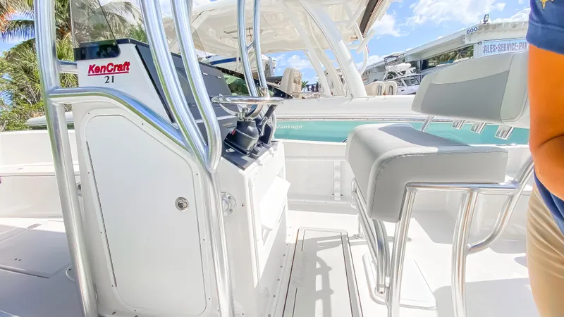 Slide: The Image of 2024 KenCraft 21 boat interior with helm station and seating. - 13