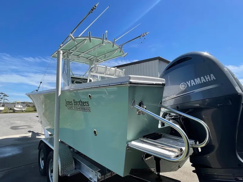 Slide: The Image of 2025 Jones Brothers 26 Cape Fisherman with twin 150 horsepower outboard engines. - 12