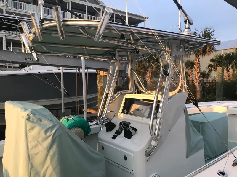 Slide: The Image of 2025 Jones Brothers 26 Cape Fisherman boat with Yamaha engine on trailer. - 13