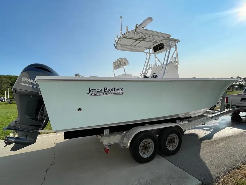 Slide: The Image of 2025 Jones Brothers 26 Cape Fisherman boat on a trailer. - 15