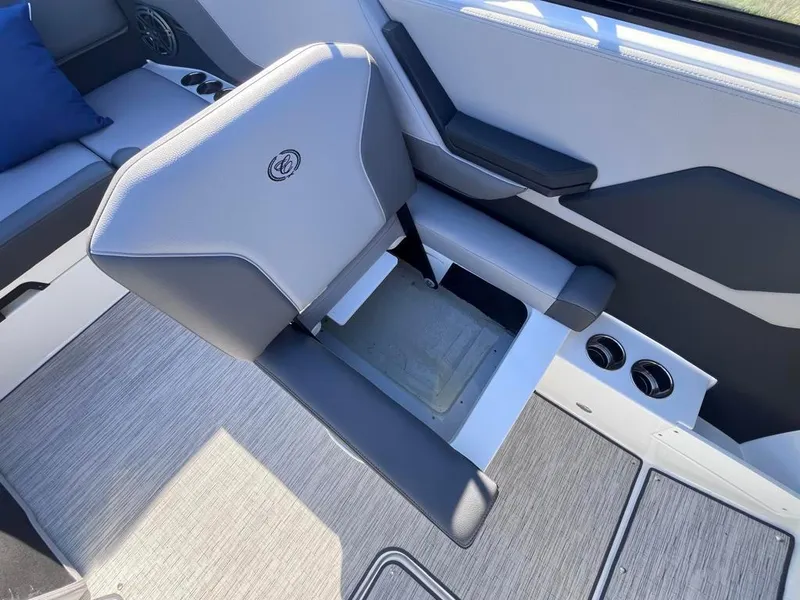 Slide: The Image of 2024 Cobalt CS23 boat interior with modern seating and sleek design. - 64