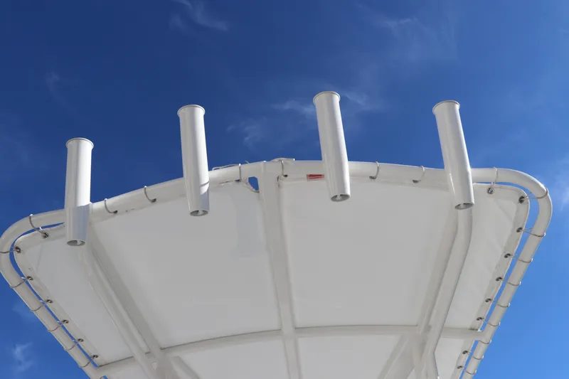 Slide: The Image of Robalo 206 Cayman 2024 boat canopy against clear blue sky. - 16