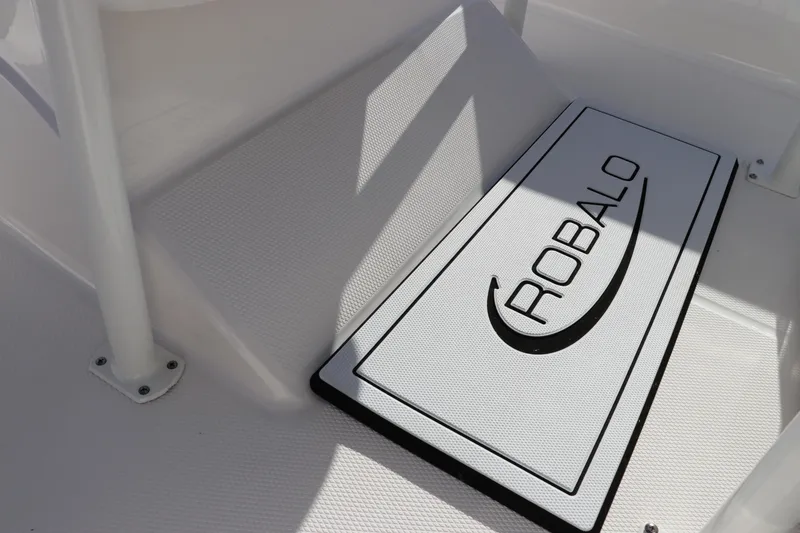 Slide: The Image of 2024 Robalo 206 Cayman boat interior with branded mat. - 19