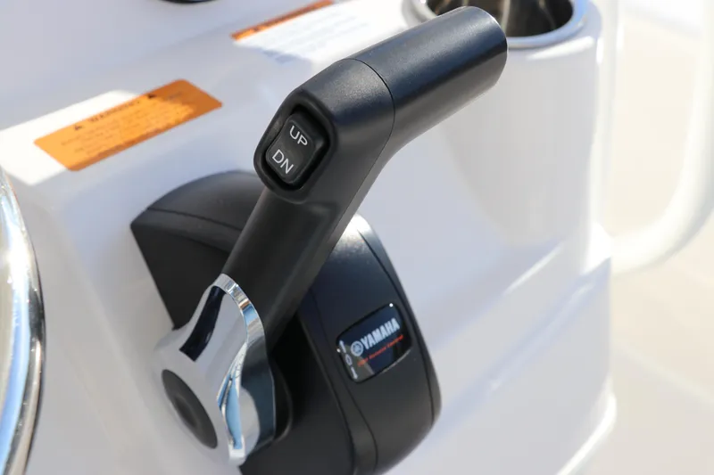 Slide: The Image of Close-up of Yamaha throttle control on 2024 Robalo 206 Cayman boat. - 22