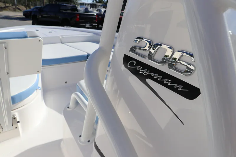 Slide: The Image of 2024 Robalo 206 Cayman boat interior with logo detail. - 26