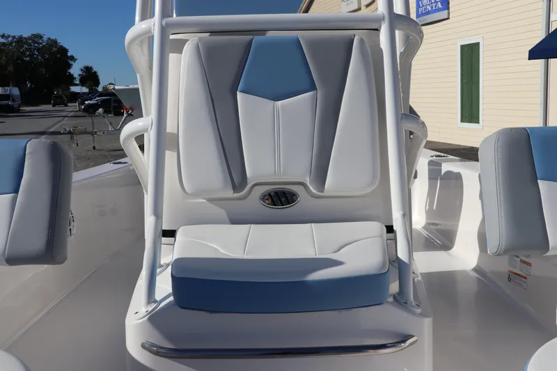Slide: The Image of 2024 Robalo 206 Cayman boat seat with blue and white upholstery. - 27