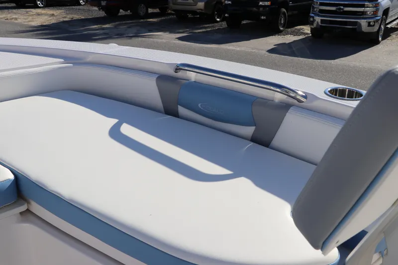 Slide: The Image of 2024 Robalo 206 Cayman boat seating area with sleek design and comfortable upholstery. - 32