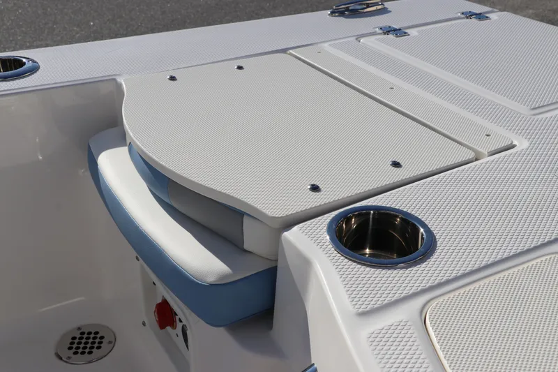 Slide: The Image of 2024 Robalo 206 Cayman boat interior with seating and cup holders. - 8