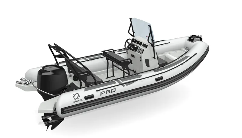 Slide: The Image of 2025 Zodiac Pro 5.5 inflatable boat with console and seating, side view. - 2