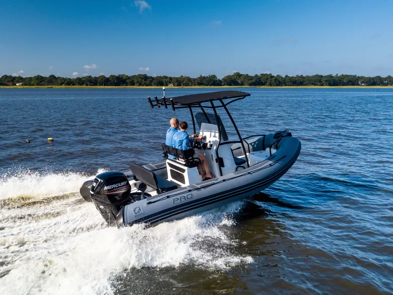 The Image of 2025 Zodiac Pro 5.5 boat cruising on a lake with two passengers. - 0