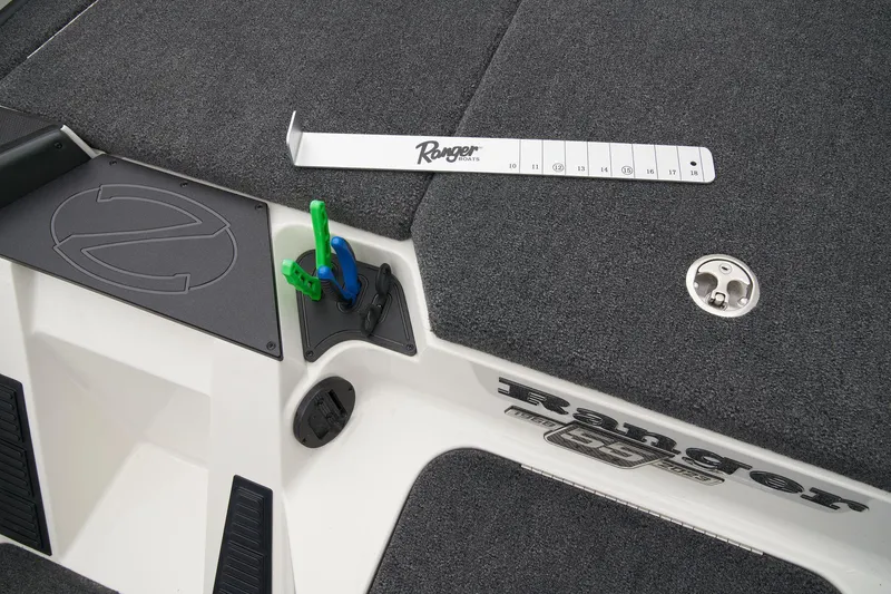 Slide: The Image of Ranger Boats logo on blue textured surface, 2024 Z518 Cup-Equipped model. - 29