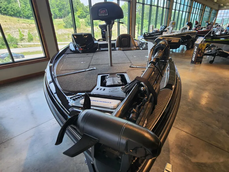 Slide: The Image of 2024 Ranger Z518 Ranger Cup Equipped boat on display in a showroom. - 2