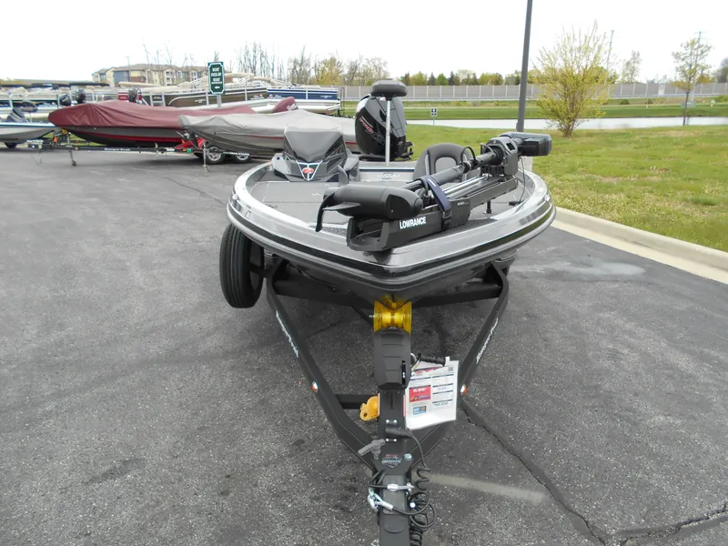 Slide: The Image of 2024 Ranger Z518 Ranger Cup Equipped boat on trailer in parking lot. - 3