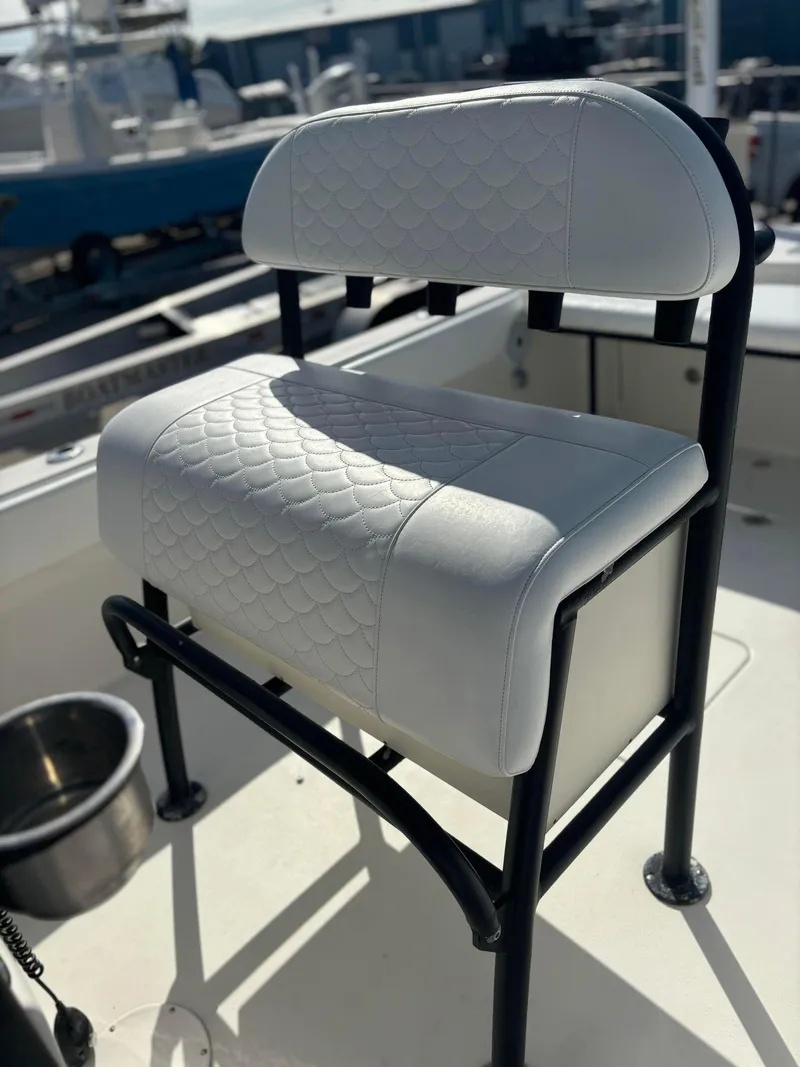 Slide: The Image of White cushioned seat on a 2014 Andros Tarpon 26 boat. - 17