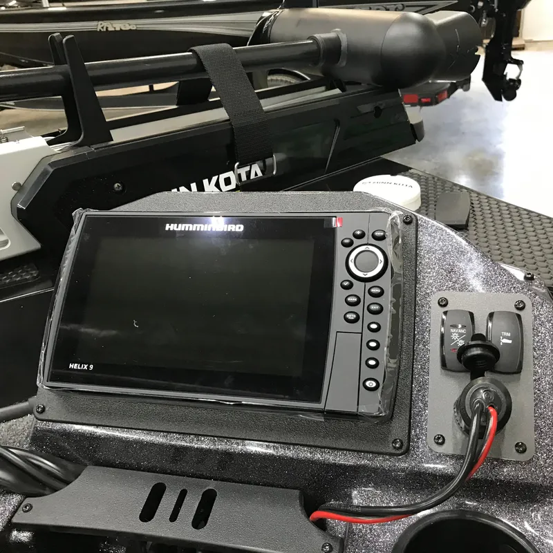 Slide: The Image of 2024 Ranger RT198P boat dashboard with Humminbird Helix 9 fish finder. - 13