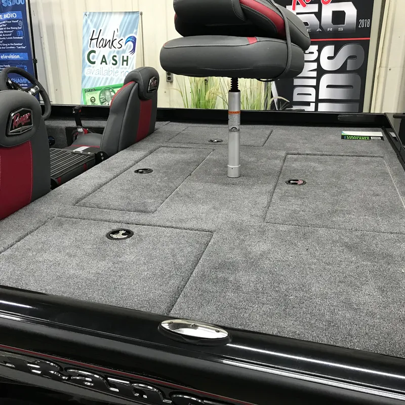 Slide: The Image of 2024 Ranger RT198P boat interior with gray carpet and adjustable seat. - 9
